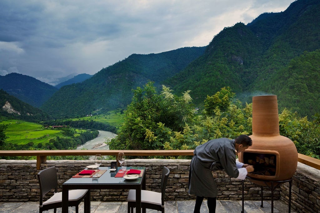 Luxurious COMO Uma Punakha hotel nestled in lush Bhutanese valley, featuring traditional architecture, mountain views, and elegant design elements