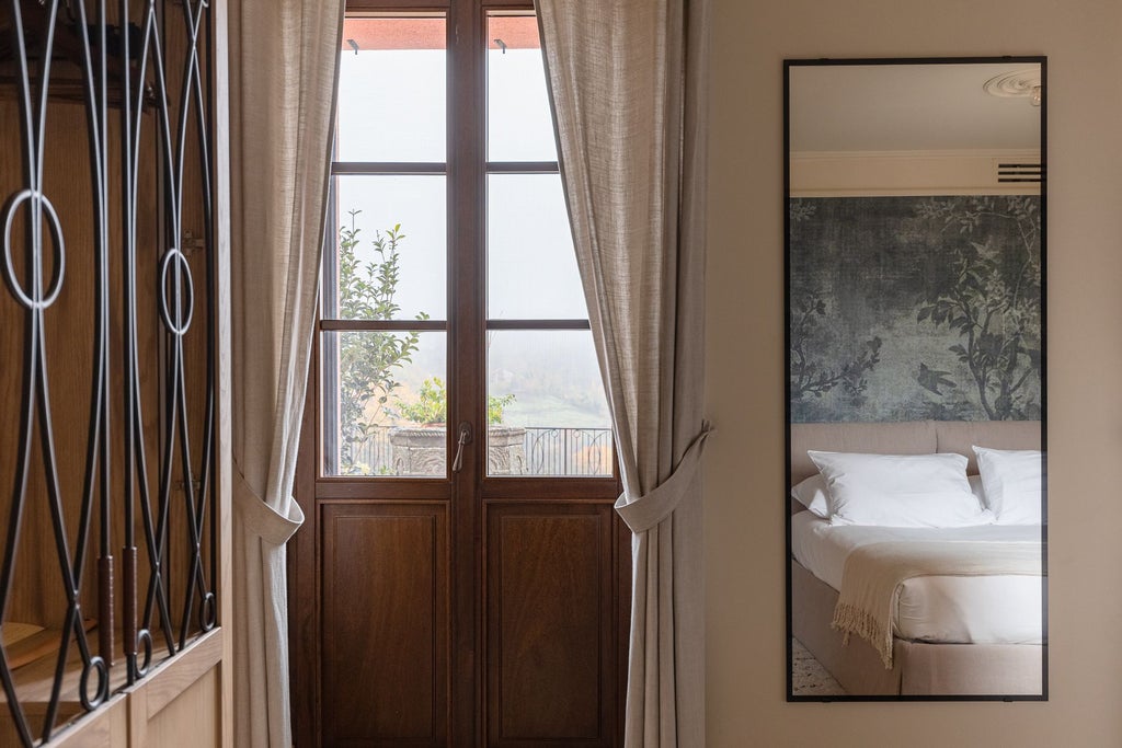 Elegantly designed hotel room with soft natural light, minimalist Italian decor, and a grand piano overlooking lush garden views at Scenset Resort