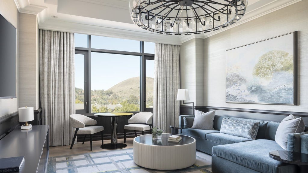 Spacious Presidential Suite at Four Seasons Hotel, featuring elegant king bed, marble bathroom, city skyline view, and luxurious contemporary design