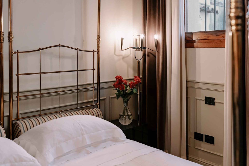 Luxurious executive hotel room with elegant wooden furnishings, crisp white linens, and panoramic windows overlooking scenic Italian landscape at Maison Matilda.