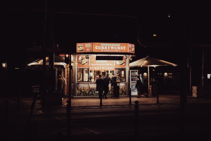 Currywurst consists of sausage tossed in a curry-spiced ketchup served with fries
