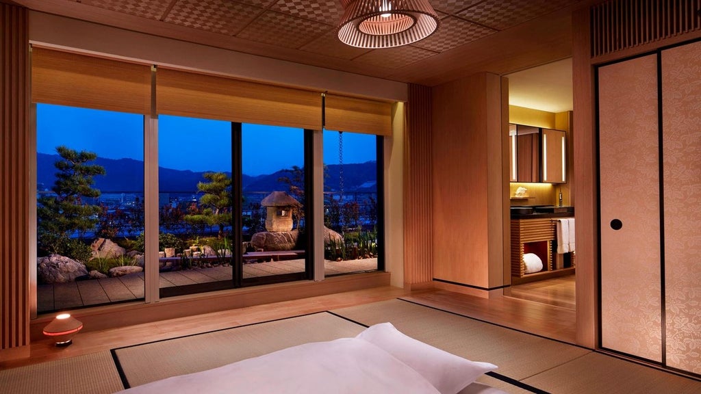 Luxurious hotel exterior with traditional Japanese design, nestled along the Kamo River in Kyoto, featuring elegant architecture and serene urban landscape at sunset.