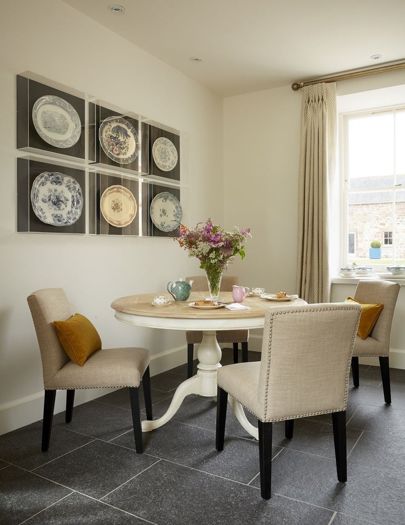 Luxurious divine suite at Newhall Mains, featuring plush king bed, elegant grey color palette, and refined contemporary Scottish countryside decor