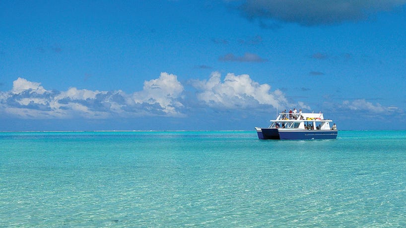 Spend time snorkeling and savoring a barbecue lunch onboard the boat.
