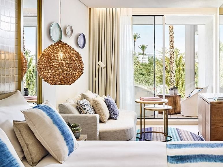 Luxurious junior suite at Nobu Hotel Ibiza Bay with private plunge pool, sleek modern decor, and breathtaking views of Mediterranean-inspired design