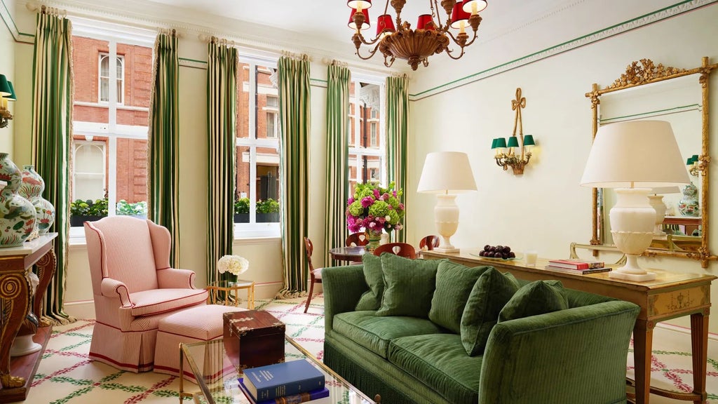 Elegant Victorian-era hotel facade with ornate windows, red brick exterior, and pristine white trim overlooking London's prestigious Kensington neighborhood