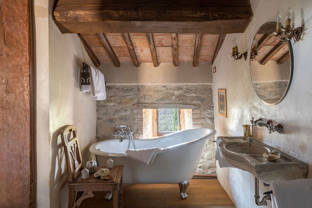 Elegant Tuscan luxury suite with rustic stone walls, antique wooden furnishings, and panoramic countryside views from a refined Italian villa bedroom