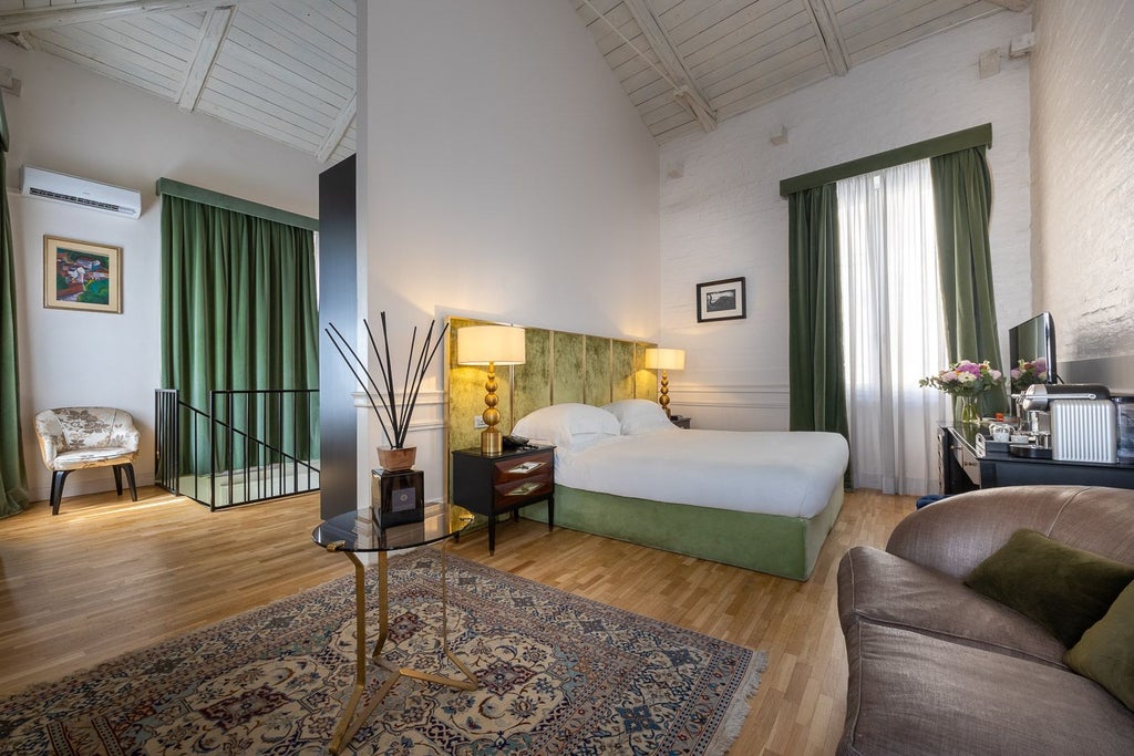 Luxurious Garden Suite at Palazzo Dama, featuring elegant white linens, modern Italian design, and lush green garden view through floor-to-ceiling windows