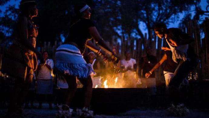 A celebration around the Boma at Mombo
