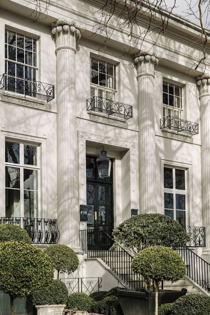 Elegant Regency townhouse hotel with period architecture, soft neutral palette, and refined interiors showcasing sophisticated British hospitality in the heart of scenset.