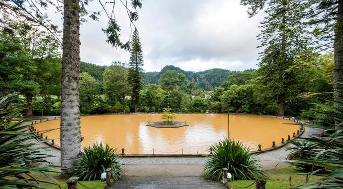 Enjoy a dip in the hot pond at the main entrance of the park