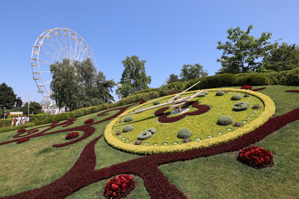 Scenic walking tour of Geneva's Old Town, showcasing elegant Swiss architecture, cobblestone streets, and Lake Geneva's sparkling waters in soft morning light