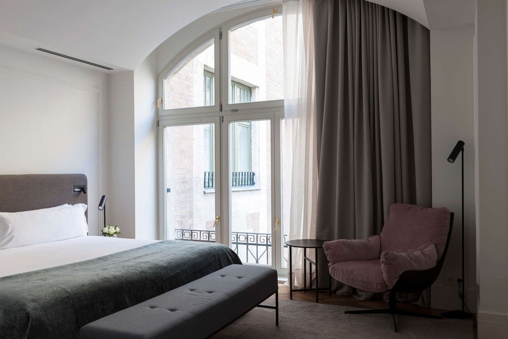 Elegant hotel suite with modern minimalist design, plush white bed, sleek wooden floors, large windows overlooking Hungarian cityscape, luxurious spa-like ambiance