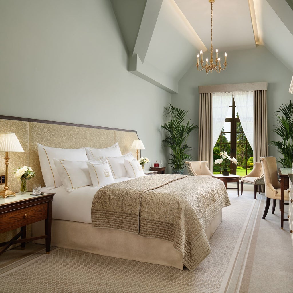 Elegant luxury hotel room at Grantley Hall with plush king bed, contemporary decor, soft neutral tones, and refined British countryside styling