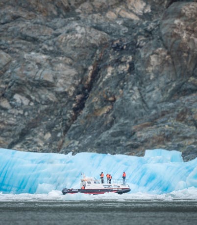 Ships bring travelers right up to the glacier's face