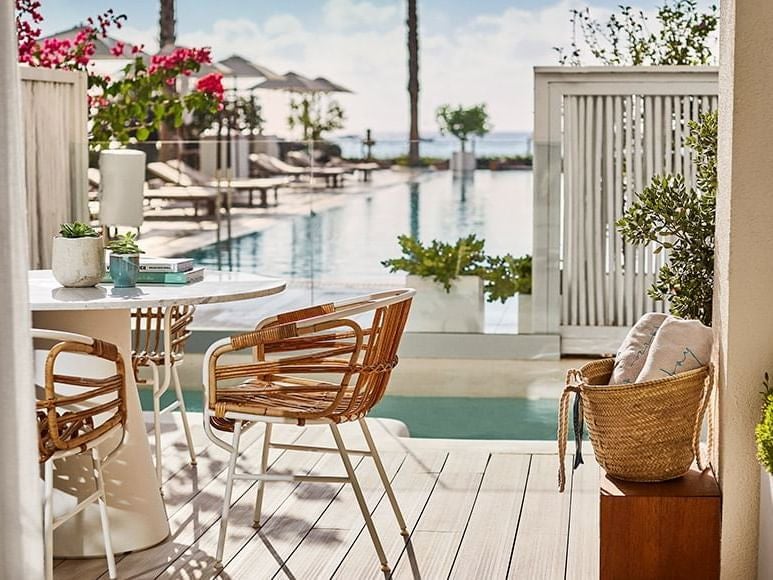 Luxurious junior suite at Nobu Hotel Ibiza Bay with private plunge pool, featuring modern design and stunning coastal view in a serene Spanish setting