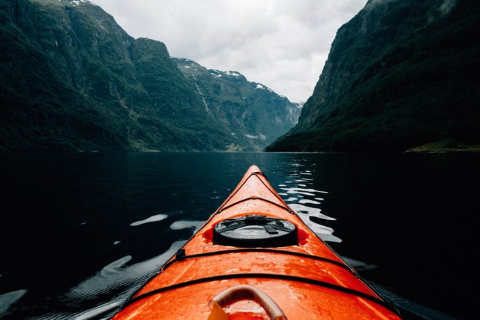 Hop in a kayak to experience the majesty of Norway