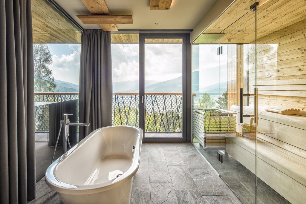 Luxurious treetop suite with panoramic windows, modern minimalist design, natural wood accents, and breathtaking forest view in an Italian mountain resort