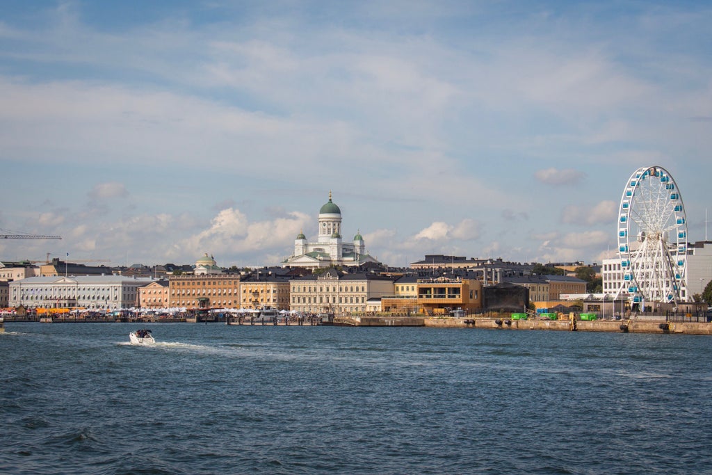 Luxury Helsinki private tour showcasing elegant streets, historic architecture, and scenic waterfront views with Finnish design elements and modern urban landscapes