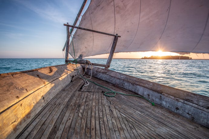 A traditional Tanzanian boat ride at dusk