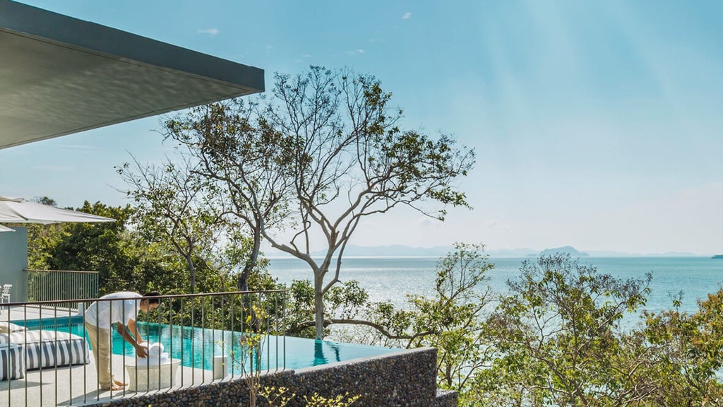 Luxurious two-bedroom pool villa at COMO Point Yamu with panoramic Andaman Sea views, featuring modern Thai-inspired design and private infinity pool