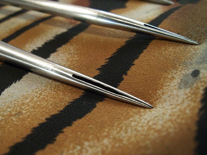 Steel needles called khem are used to create a Sak Yant