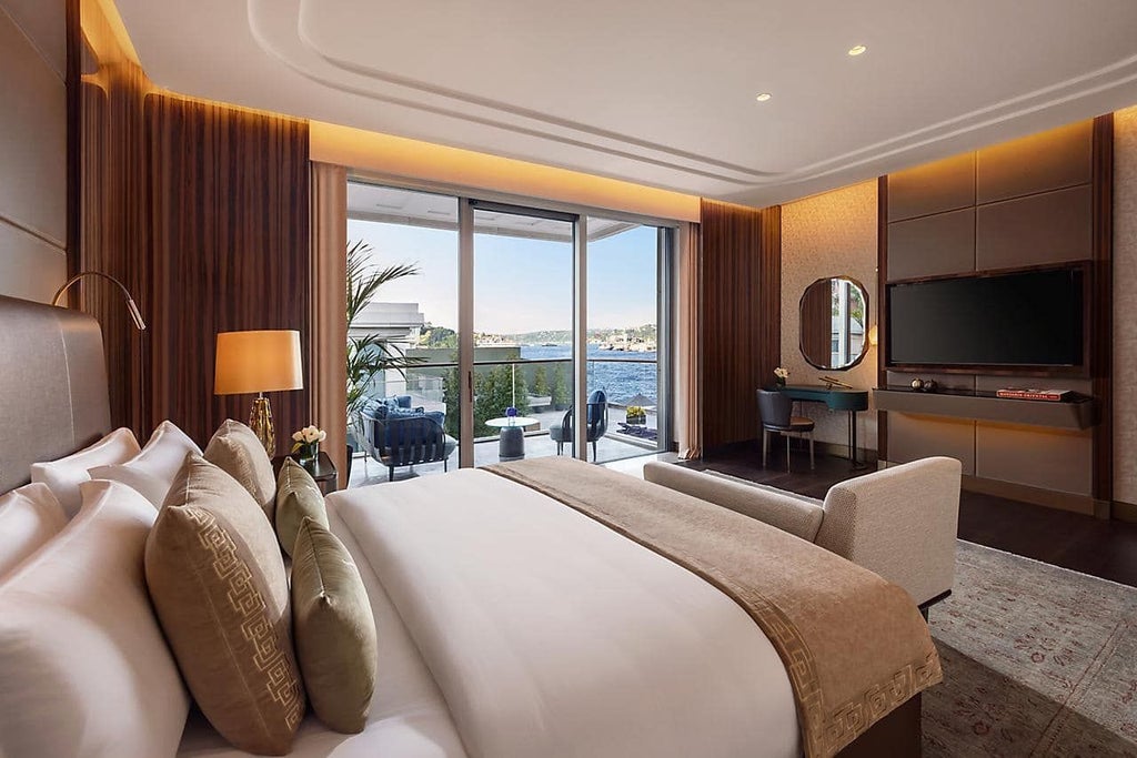 Spacious luxury family room at Mandarin Oriental Bosphorus, featuring elegant king/twin beds, modern decor, and panoramic views of Istanbul's skyline