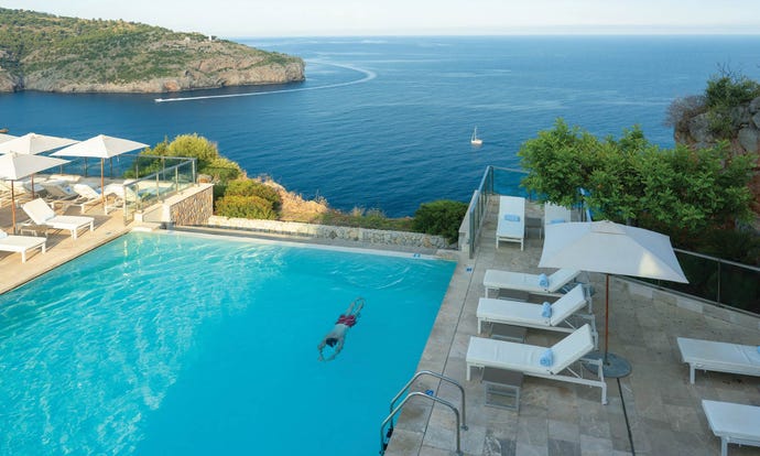 Infinity pool looking into the eternal blue of the sea
