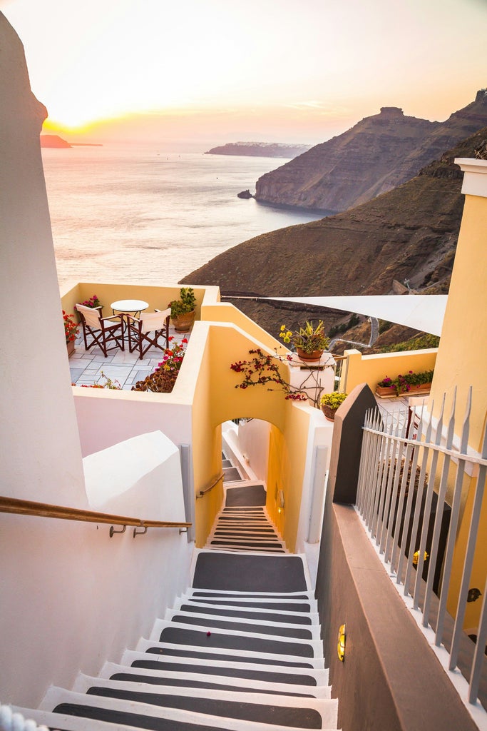 Luxurious private tour showcasing white-washed Santorini villages, blue-domed churches, and ancient Akrotiri archaeological site against dramatic Aegean Sea backdrop