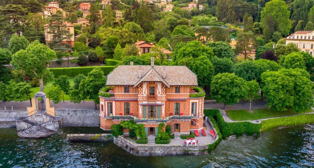 Luxurious Renaissance villa with ornate gardens overlooking Lake Como, featuring terraced fountains and manicured Italian landscapes