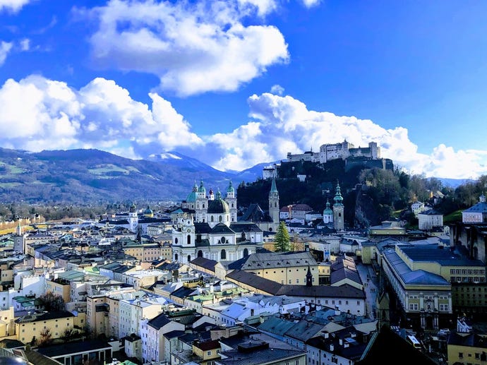 View of Salzburg's castle, with the alpine meadows beyond