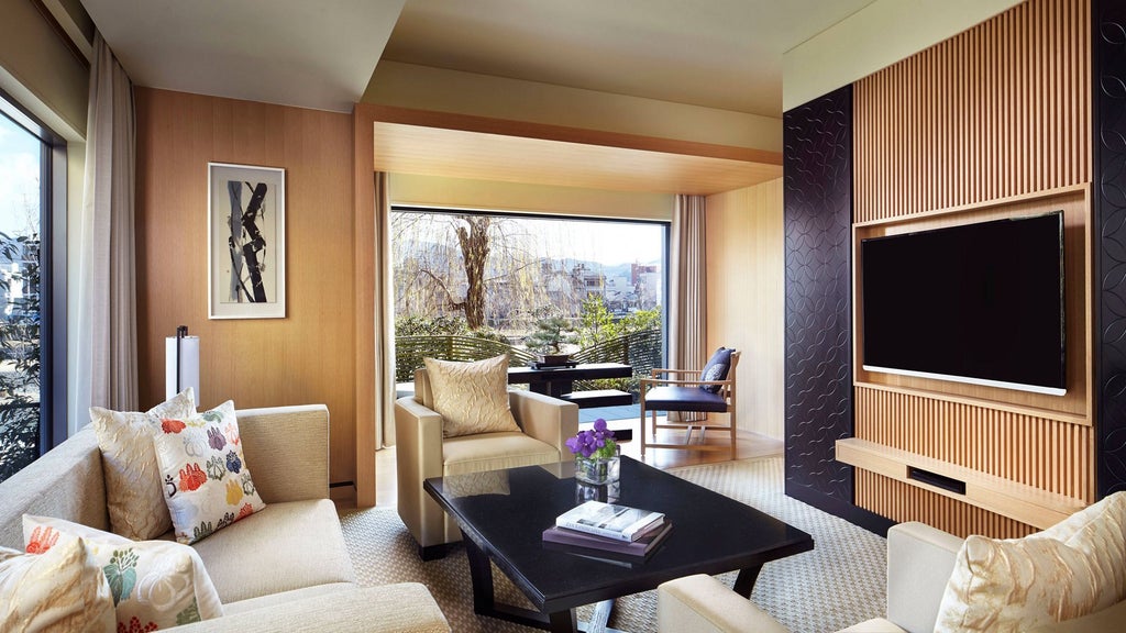 Modern Japanese luxury hotel with zen garden, reflecting pool, and traditional stone lanterns against a backdrop of elegant architecture