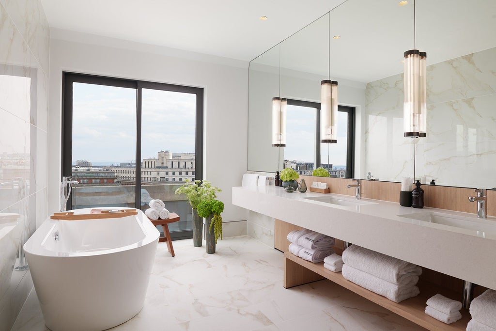 Spacious Nobu Hotel penthouse suite with elegant contemporary design, plush king bed, city views, and modern minimalist luxury furnishings in London's Portman Square