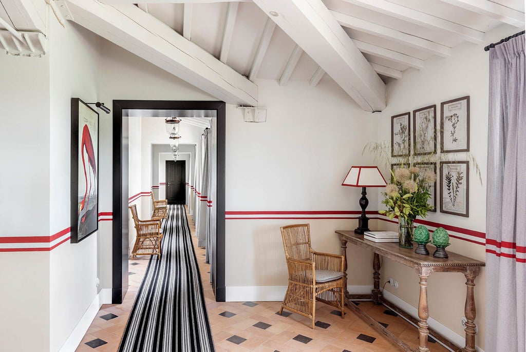 Elegant Deluxe Junior Suite King at Locanda Rossa, showcasing rustic Italian charm with plush bedding, warm terracotta tones, and refined wooden furnishings