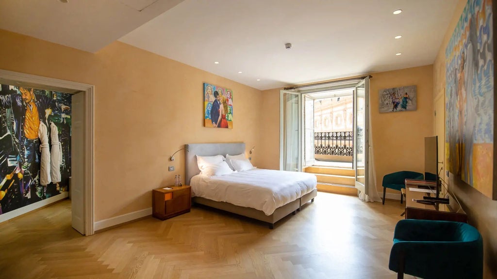 Luxurious hotel room with elegant Italian design, high ceiling, artistic wall decor, plush furnishings, and expansive windows overlooking Milan's architectural landscape