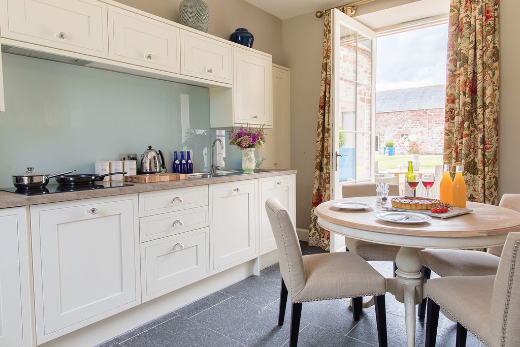 Charming stone cottage interior with plush armchairs, soft throws, and warm lighting, showcasing a cozy family living space in a traditional United Kingdom setting