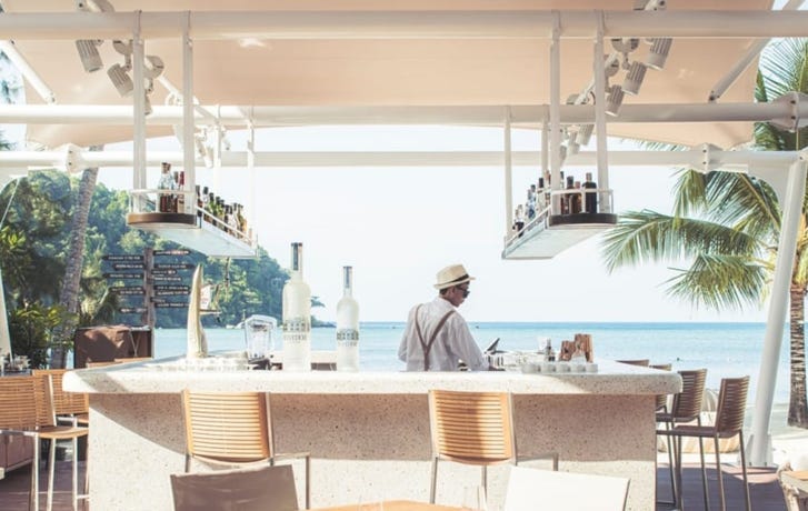 Enjoy a drink at the hotel's beach bar
