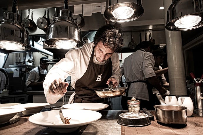 Chef Jose Avillez meticulously plating up at Belcanto