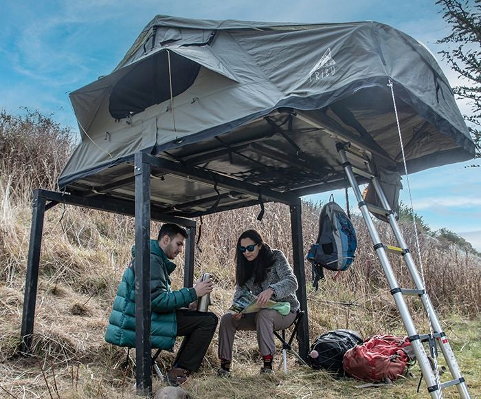 Luxurious premium camping room at Hotel Las Torres Patagonia, featuring elegant design with mountain-inspired decor and panoramic wilderness views in Chile