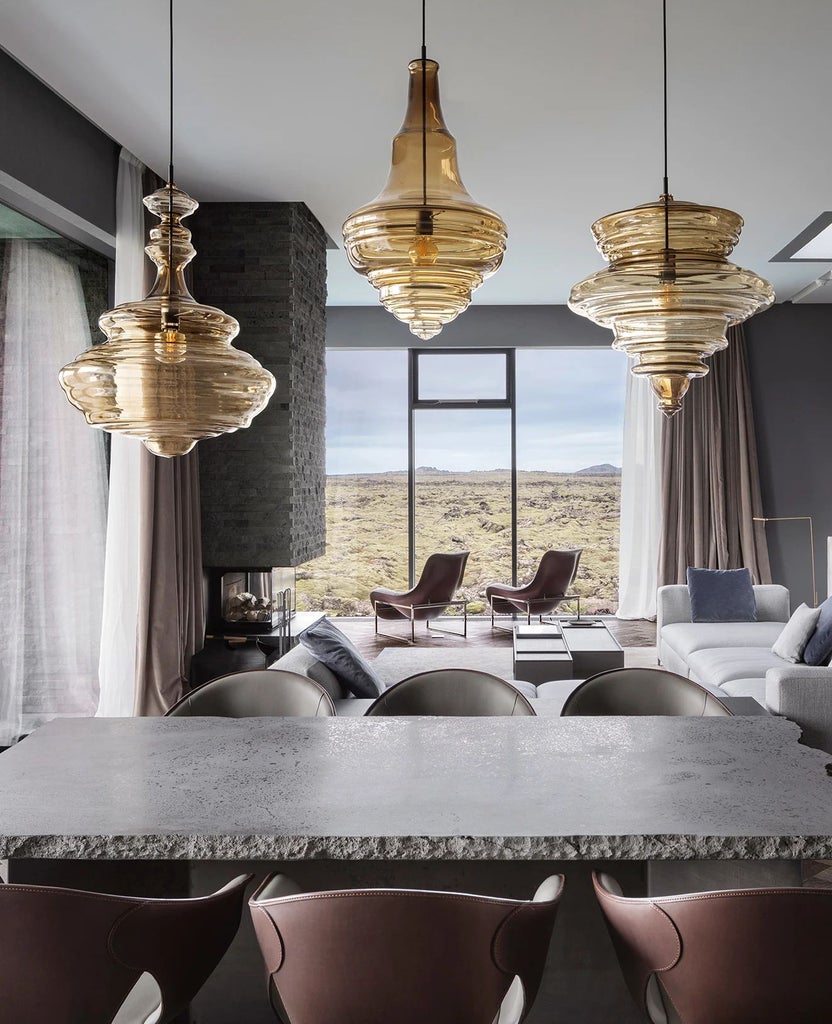 Minimalist Icelandic luxury suite with floor-to-ceiling windows, panoramic lagoon view, sleek Nordic design, and elegant neutral color palette