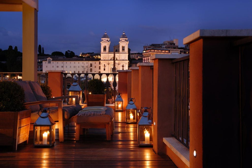 Elegant rooftop terrace of luxurious boutique hotel overlooking Rome's historic skyline, with golden sunlight and sophisticated Italian design details