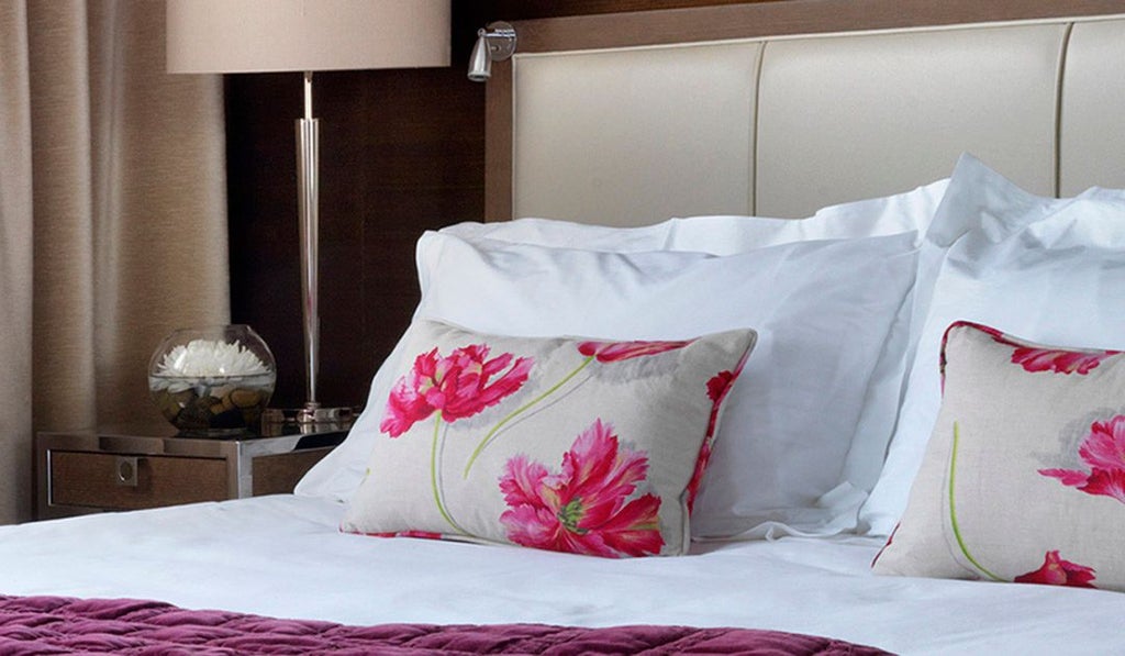 Luxurious cosy hotel room at The Scenset with plush bedding, warm neutral tones, minimalist design, and elegant contemporary furnishings in United Kingdom