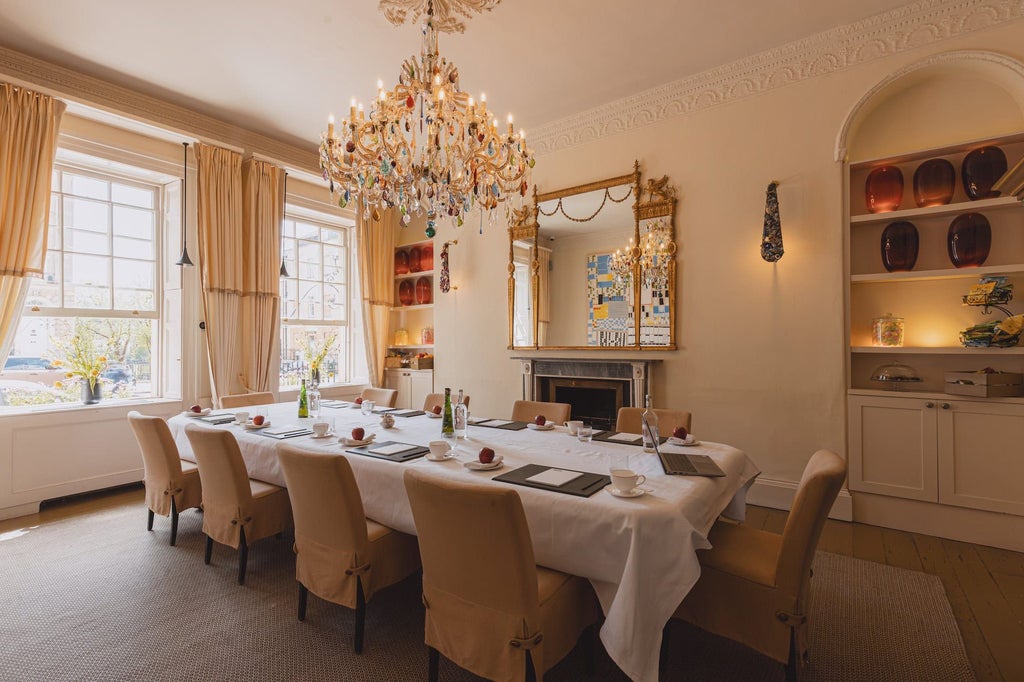 Elegant boutique hotel exterior with Georgian architecture, soft warm lighting, classic stone facade, and inviting entrance in historic Bath, United Kingdom.