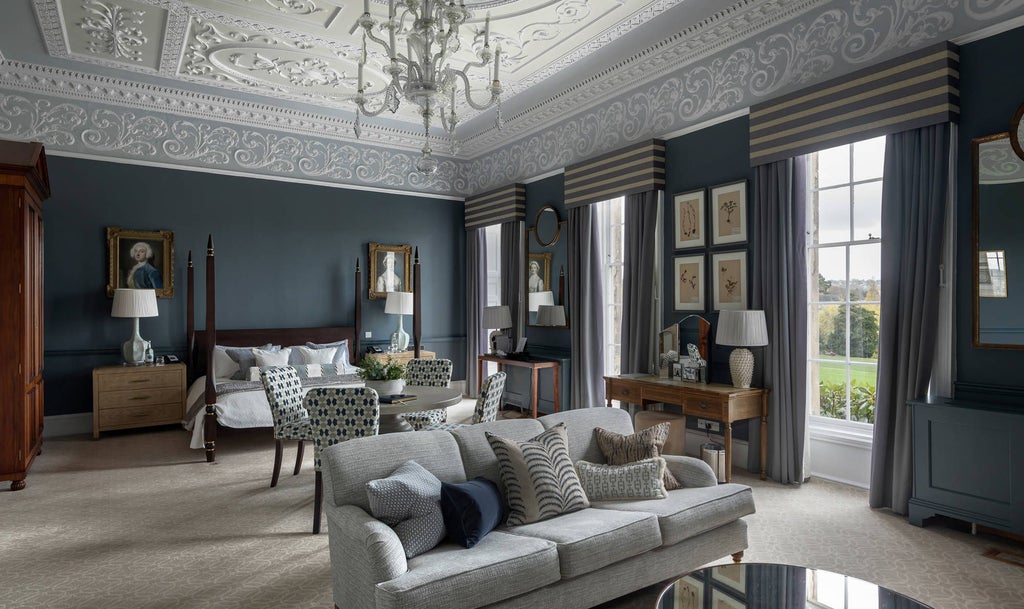 Elegant master suite at The Royal Crescent Hotel & Spa, featuring opulent décor, plush king-size bed, and sophisticated Georgian-style architectural details in Bath, UK.