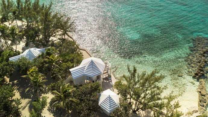 The turquoise waters around the private island of Long Cay