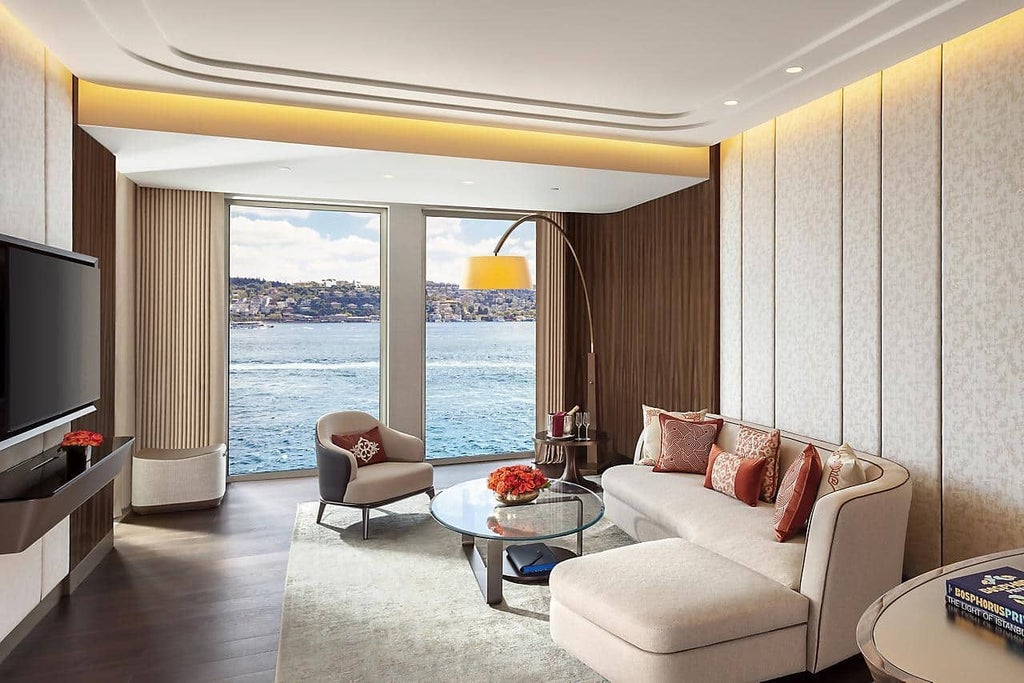 Luxurious Mandarin Bosphorus Room with panoramic sea views, contemporary Turkish design, plush king bed, and elegant marble bathroom in Istanbul's finest hotel