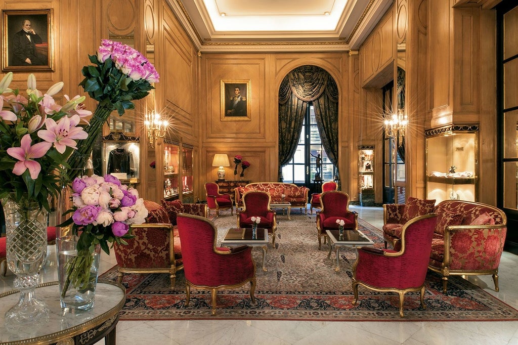 Elegant French-style facade of Alvear Palace Hotel with ornate balconies, classic architecture, and warm lighting at dusk in Buenos Aires