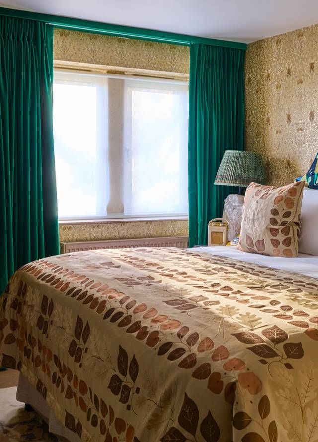 Elegantly designed luxury hotel room with plush king bed, soft neutral tones, modern minimalist decor, and ambient lighting at Homewood Hotel & Spa in the United Kingdom