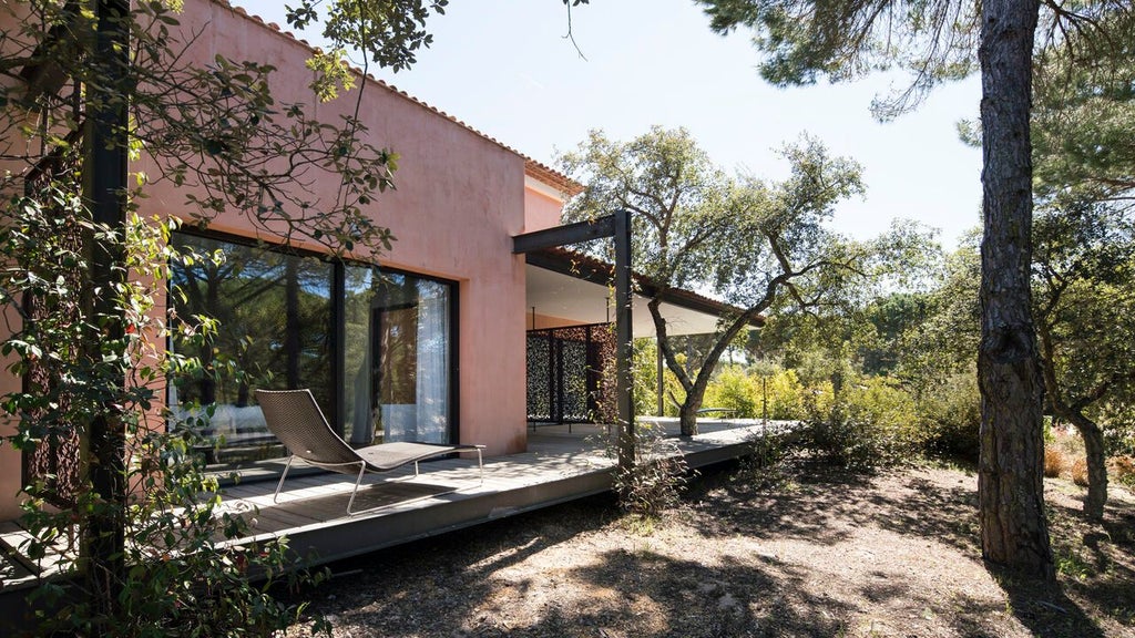 Minimalist bio-pool suite at Sublime Comporta Hotel, featuring sleek wood design, natural light, and tranquil Portuguese coastal landscape view