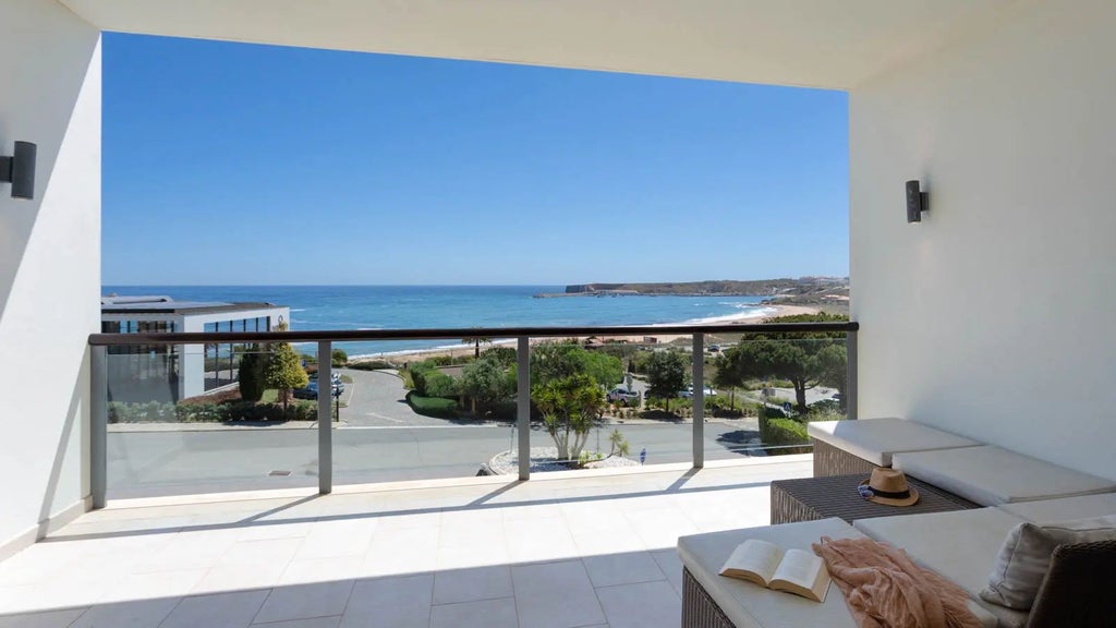 Spacious modern Ocean House with panoramic sea view, minimalist white design, private terrace overlooking Sagres coastline at luxury family resort